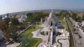 Wat Rong Khun The White Temple of Chiang Rai seen from a Drone Uncut  HD