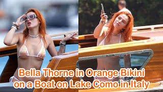 Bella Thorne in Orange Bikinion a Boat on Lake Como in Italy