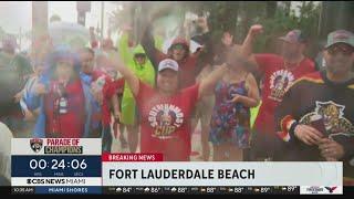 Fans stick out the rain to see Florida Panthers parade of champions