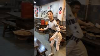 A Robotic Waiter Serves Food at a Chongqing Hotpot Restaurant in China #robotserver