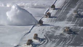 WATCH Logan Airports snow plows blowers hard at work after noreaster hits Boston Massachusetts