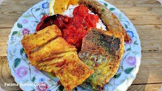 Fried Snoek  with Tomato and onion smoortjie served with white rice.