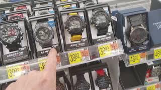 at Walmart checking out Armitron watches on sale