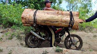 riding a homemade motorbike carrying heavy teak wood on extreme roads