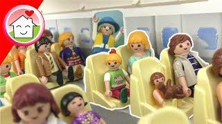 Playmobil Film Familie Hauser - Im Flugzeug - Flug nach London - Video für Kinder