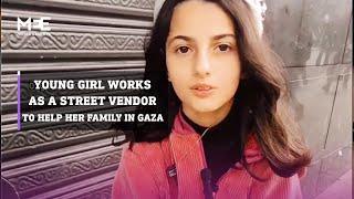 Young Palestinian girl works as a street vendor to help family in Gaza