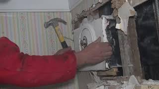 Ripping open a wall-safe inside house demolition #30