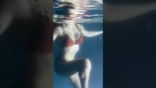 Thin Zar Wint Kyaw swimming in pool