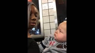 Baby Stares At Woman Then Smirks