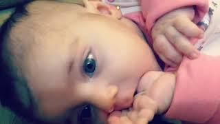 Cute baby girl sucking her fingers