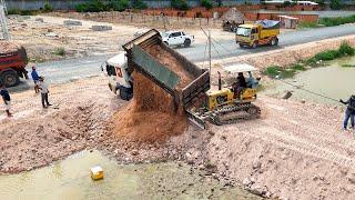 5ton dump truck Stucked Unloading Filling land into water Using bulldozer KOMATSU D20P