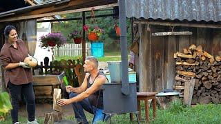 Village life in Belarus. Cooking roast on the fire. Unsettled life in the village