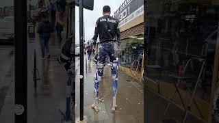 9 foot man arguing with a traffic warden