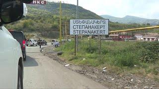 Journalists enter Stepanakert in Nagorno-Karabakh with Azerbaijani officials  AFP