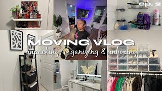 moving vlog ep. 2  unpacking boxes organizing my bathroom and closet and opening packages
