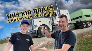 Kid drives a BRAND NEW Peterbilt Truck