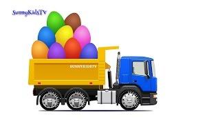 Dump truck unloads Surprise Eggs filled with Fruits.