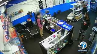 Video shows wild shootout with guard at Compton smoke shop that led to robbery suspects death