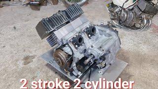 I built a 2 stroke engine turning 1 cylinder into 2 cylinders 2 stroke