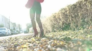 Walking in high heels over autumn leaves. What an amazing pair of overknee boots.