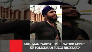 Sikh Man Takes Out His Sword After UP Policeman Pulls His Beard