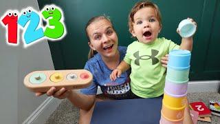 Toddler Reacts To NEW Toys Stacking Counting & Matching