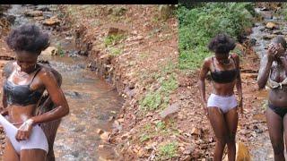 African girls bathing in the river
