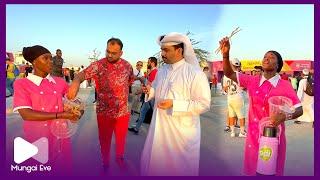 Awinjaa “Jacky Vike” Sported Hawking Njugu And Mukhombero in Qatar World Cup Outside The Stadium