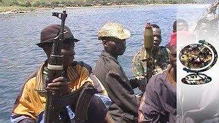 Mai-Mai Guerrillas Fight For The Kabila Regime 2001