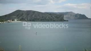 LONE WINDSURFING IN THE BAY RETMZDEZG