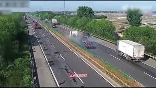 Car avoids metal roll on highway