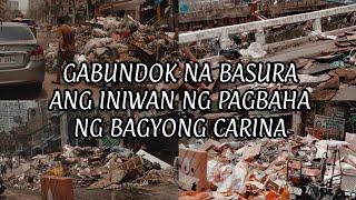 GABUNDOK NA BASURA ANG INIWAN NG PAGBAHA NG BAGYONG CARINA