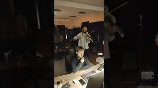 FRAM in studio with violin