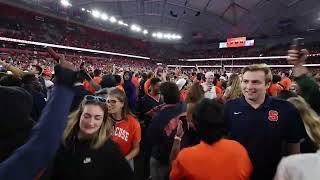 Syracuse fans rush the field after beating N.C. State