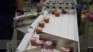 Merging and Laning System for Sauce Packaging