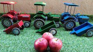 red blue and green colour tractors loading apples video Kiran Toys world