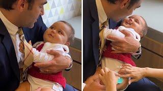 Dad adorably distracts baby during doctors visit