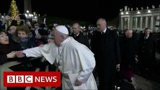 Popes annoyance over arm yank - BBC News