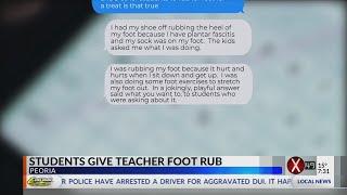 Students give teacher foot rub