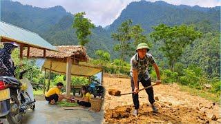 While Phuong Vy was picking beans to sell Phuong Vys uncle was leveling the floor of the house