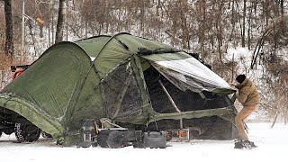 Camping in a Blizzard Catch a Dinosaur Tent Flying in a Snowstorm