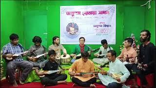 দোতারায় বলি ও ননদী আর দু-মুঠো গানটি বাজানোর প্রশিক্ষণ। স্বরলিপি দেখে সমবেত অনুশীলন। boli o nonodi