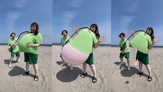 巨大風船を服の中に入れて海で割れるまで膨らませてみた結果2024年夏！ Balloon Pop Water Panic in the Beach 2024 ver.