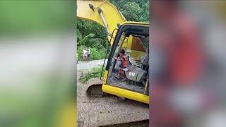 Five-year-old boy operates excavator in Indonesia