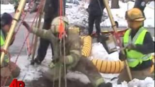 Raw Video Firefighters Rescue Dog From Sewer