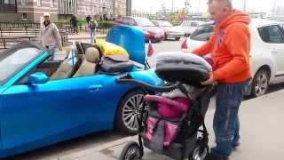 Запихиваю детскую коляску в багажник BMW Z4