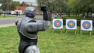 Robocop vs Iron Man - knife throwing contest