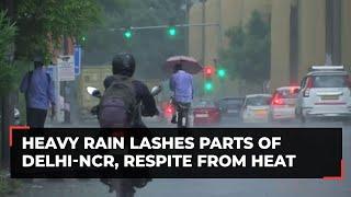 Heavy rain lashes parts of Delhi-NCR respite from heat IMD predicts more showers