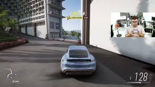 Lets play the game Forza Horizon 5 drive a gray-blue supercar on the sand