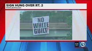 VIDEO No white guilt sign hung over Route 2 upsets drivers